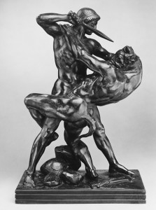 Black sculpture of Theseus slaying a minotaur.