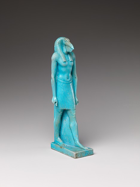 Bright blue figure of Thoth walking.