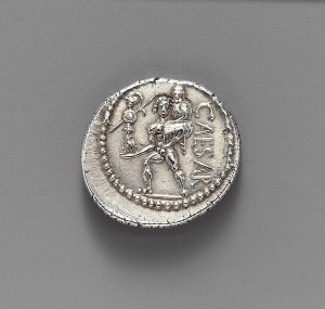 A silver coin depicting Julius Caesar.